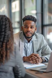 Salesperson engaging in consultative selling with a client, showcasing active listening and solution-oriented discussion