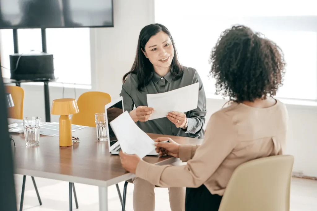 Two businesswomen meeting in an office